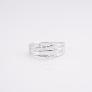 Anillo Triple Linea Semi Grueso Una con 3 Circonitas y otra con 1 Circonita T.19,5
